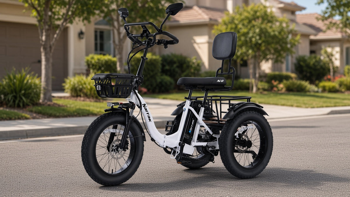 Semi recumbent electric trike: Narrak N8 sit-back trike with high backrest and butterfly bar on a suburban driveway