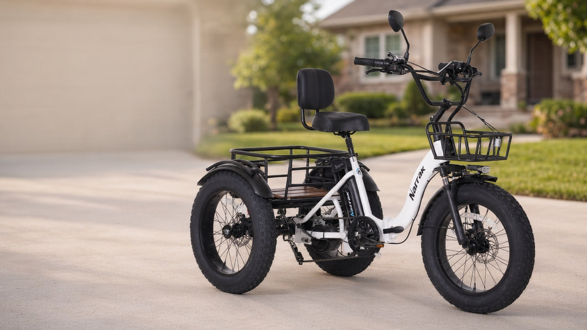 How much are electric tricycles — Narrak S180 folding three-wheel e-trike in a suburban driveway with grocery bags